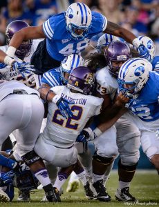 Trent Nelson  |  The Salt Lake Tribune Brigham Young Cougars defensive lineman Tomasi Laulile (48) comes over the top on a third down stop as BYU hosts East Carolina, college football at LaVell Edwards Stadium in Provo, Saturday October 10, 2015.