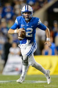 Trent Nelson  |  The Salt Lake Tribune Brigham Young Cougars quarterback Tanner Mangum (12) scrambles as BYU hosts East Carolina, college football at LaVell Edwards Stadium in Provo, Saturday October 10, 2015.