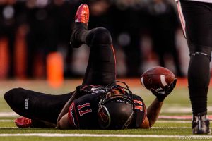 Trent Nelson  |  The Salt Lake Tribune Utah Utes wide receiver Raelon Singleton (11) on the ground after a hard hit as the University of Utah hosts Oregon State, NCAA football at Rice-Eccles Stadium in Salt Lake City, Saturday October 31, 2015.