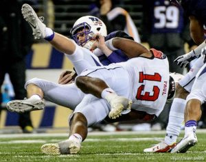Trent Nelson  |  The Salt Lake Tribune Utah Utes linebacker Gionni Paul (13) sacks Washington Huskies quarterback Jake Browning (3) as the University of Utah faces the University of Washington, NCAA football at Husky Stadium in Seattle, Saturday November 7, 2015.