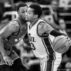 Trent Nelson  |  The Salt Lake Tribune Utah Jazz guard Trey Burke (3), right, defended by Toronto Raptors guard Kyle Lowry (7), as the Utah Jazz host the Toronto Raptors, NBA basketball at Vivint Smart Home Arena in Salt Lake City, Wednesday November 18, 2015.