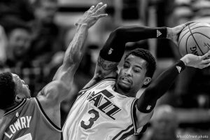 Trent Nelson  |  The Salt Lake Tribune Utah Jazz guard Trey Burke (3) looks to pass under pressure from Toronto Raptors guard Kyle Lowry (7) as the Utah Jazz host the Toronto Raptors, NBA basketball at Vivint Smart Home Arena in Salt Lake City, Wednesday November 18, 2015.