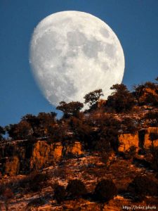 moon at sunset, Sunday November 22, 2015.