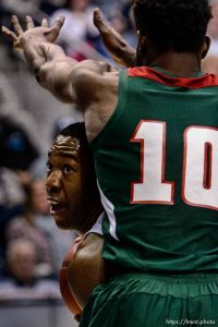 Trent Nelson  |  The Salt Lake Tribune Brigham Young Cougars forward Jamal Aytes (40) looks out from under Mississippi Valley State Delta Devils forward Ta'Jay Henry (10), as BYU hosts Mississippi Valley State, NCAA basketball at the Marriott Center in Provo, Wednesday November 25, 2015.