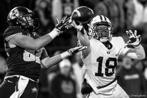 Trent Nelson  |  The Salt Lake Tribune Brigham Young Cougars defensive back Michael Shelton (18) knocks the ball away from Utah State Aggies wide receiver Andrew Rodriguez (82) as Utah State hosts BYU, NCAA football in Logan, Saturday November 28, 2015.