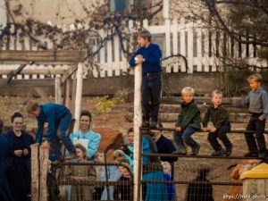 Trent Nelson  |  The Salt Lake Tribune People look on as a fire burns at the clinic in Hildale, Wednesday December 2, 2015.