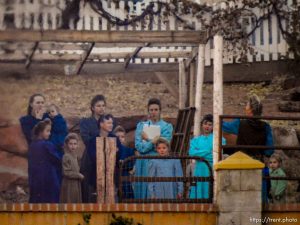 Trent Nelson  |  The Salt Lake Tribune People look on as a fire burns at the clinic in Hildale, Wednesday December 2, 2015.