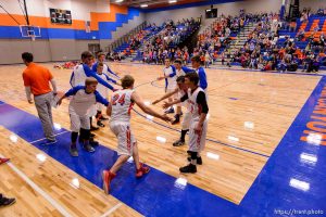 Trent Nelson  |  The Salt Lake Tribune Water Canyon School's Mario Barlow is introduced as the team prepares to face Escalante in the first high school basketball game in the school's a gym, which used to be the FLDS bishop's storehouse, in Hildale, Wednesday December 2, 2015.