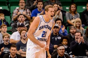Trent Nelson  |  The Salt Lake Tribune BYU's Kyle Davis lets out a cougar roar as BYU faces Weber State, NCAA basketball at Vivant Smart Home Arena in Salt Lake City, Saturday December 5, 2015.
