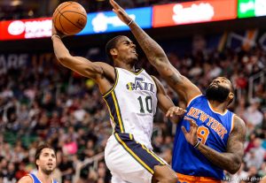 Trent Nelson  |  The Salt Lake Tribune Utah Jazz guard Alec Burks (10) goes up for a dunk, with New York Knicks forward Kyle O'Quinn (9) defending, as the Utah Jazz host the New York Knicks, NBA basketball at Vivint Smart Home Arena, Wednesday December 9, 2015.