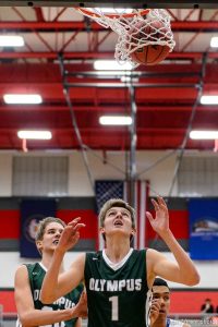 Trent Nelson  |  The Salt Lake Tribune Olympus's Isaac Monson (20) and Olympus's Travis Wagstaff (1) look up to the ball as Bingham plays Olympus in the first round of the boys' basketball Elite 8 Tournament at American Fork High School, Thursday December 10, 2015.