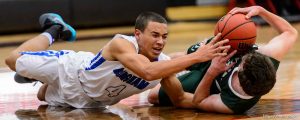 Trent Nelson  |  The Salt Lake Tribune Bingham's Dason Youngblood (4) and Olympus's Nate Fox (3) chase down a loose ball as Bingham plays Olympus in the first round of the boys' basketball Elite 8 Tournament at American Fork High School, Thursday December 10, 2015.