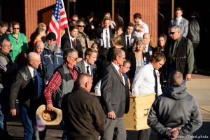 Trent Nelson  |  The Salt Lake Tribune
Pallbearers carry the casket, and family follows, at the funeral for Robert 