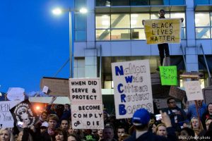 Trent Nelson  |  The Salt Lake Tribune Protesters at the Wallace Bennett Federal Building protest the police shooting of 17-year-old Abdi Mohamed on Saturday night, Monday February 29, 2016.