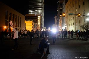 Trent Nelson  |  The Salt Lake Tribune Protesters occupy the intersection of 100 south state street near the Wallace Bennett Federal Building and march to the Public Safety Building to protest the police shooting of 17-year-old Abdi Mohamed on Saturday night, Monday February 29, 2016. Rick Bowmer