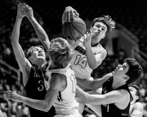 Trent Nelson  |  The Salt Lake Tribune Bingham's Brayden Cosper (14) pulls down a rebound as Bingham faces Lone Peak in the 5A state high school basketball championship game, Saturday March 4, 2017.
