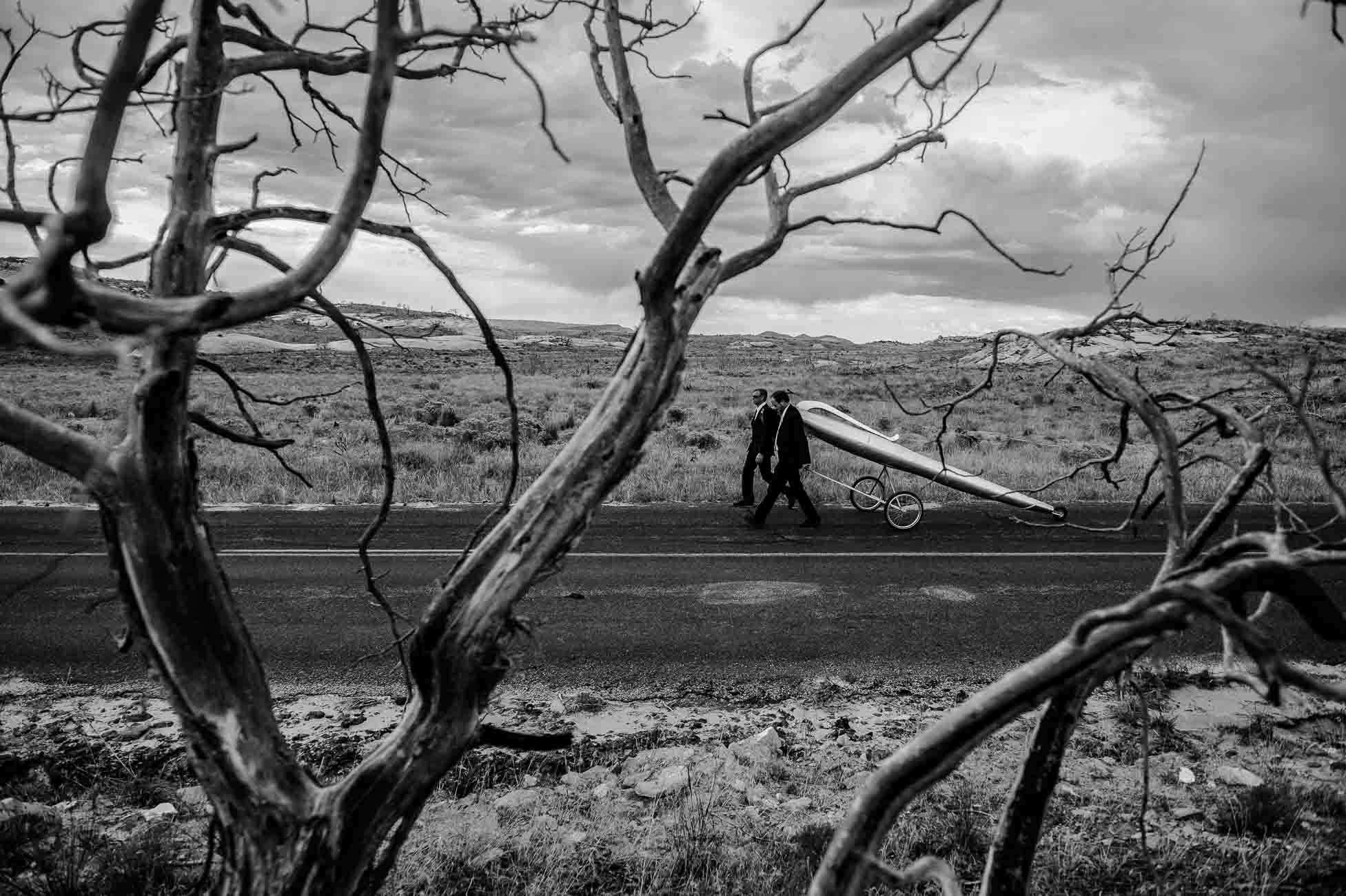 (Trent Nelson | The Salt Lake Tribune)  German artists Wolfgang Aichner and Thomas Huber on the first day of their art project, Linear, about ten miles northwest of Vernal Wednesday September 13, 2017. The duo are launching a four-week long performance art project in which they are filming themselves dragging an oversized giant silver pen through a 250-mile rectangular through the deserts of Utah, Wyoming and Colorado.