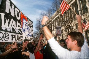 Anti-war protesters and war supporter clash at Gulf War protest.