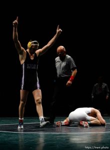 Orem - Lehi's Cam Phillips celebrates victory over Rodney Cox (Spanish Fork) in the 135 lb weight class, 5A State High School Wrestling Championships, held at UVSC, Friday, February 15, 2008.