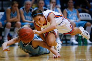 Timpview's Gabrielle Pinegar (right) dives for the loose ball, knocking it away from Sky View's Liz Malmberg. Taylorsville - Timpview vs. Sky View High School, 4A Girls State Basketball Championships at Salt Lake Community College.