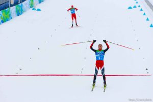 Team 4x5km Nordic Combined on the cross country track at the Whistler Olympic Park, XXI Olympic Winter Games in Whistler, Tuesday, February 23, 2010. austria's Mario Kreiner (front) and USA's bill demong approach the finish line. Austria gold medal, USA silver