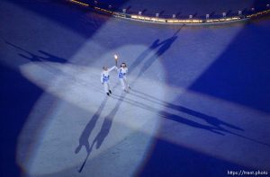 Scott Hamilton, Dorothy Hamill with torch. Opening Ceremony, 2002 Olympic Winter Games.; 02.08.2002, 9:28:54 PM