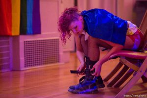 Frieda Hamilton puts on a pair of boots before Rock Camp for Womyn's showcase, a live performance. People attending the camp learn how to play instruments, form bands, write songs, and perform live in concert — all in three days. It's a new program by the same group that does Rock and Roll Camp for Girls. Salt Lake City, Sunday February 4, 2018.