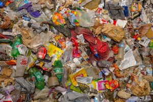 (Trent Nelson | The Salt Lake Tribune)  Garbage from squatters fills the basement of a dilapidated, fire-damaged building near 100 South 700 East in Salt Lake City, Thursday Feb. 15, 2018. Other Side Academy has received approval to demolish it for their expansion.