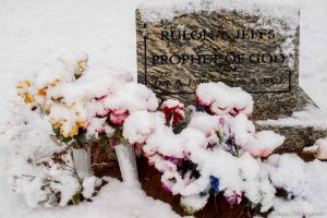 rulon jeffs grave site with snow-covered flowers, cemetery, Thursday March 15, 2018.