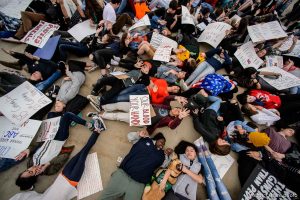 (Trent Nelson | The Salt Lake Tribune)   High school students staged a die-in at the Utah State Capitol in Salt Lake City to mark the anniversary of the Columbine High School massacre and call for action against gun violence, Friday April 20, 2018.