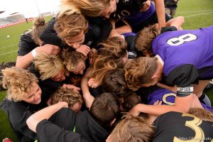 (Trent Nelson | The Salt Lake Tribune)   Desert Hills players celebrate their win over Park City High School in the 4A state championship game, Saturday May 12, 2018.