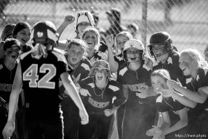 (Trent Nelson | The Salt Lake Tribune)   Bountiful faces Box Elder High School in the 5A Softball State Championship game, Thursday May 24, 2018. Box Elder players celebrate a home run by Box Elder's Nyah DeRyke (42).