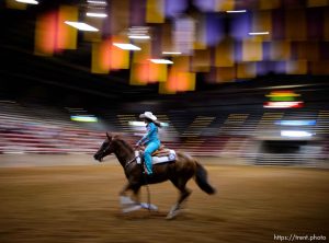 (Trent Nelson | The Salt Lake Tribune)   Contestants in the Miss Utah Rodeo pageant compete in the horsemanship competition at the Golden Spike Arena in Ogden, Thursday July 19, 2018. McKaylie Richins.