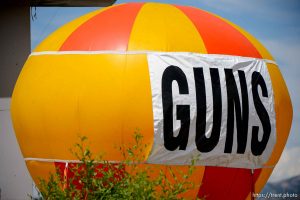 guns sign on balloon, 1st cash pawn shop, state street, slc, Saturday July 21, 2018.