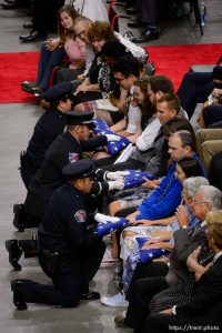 (Trent Nelson | The Salt Lake Tribune)   West Valley City police officers perform a flag presentation for family members at funeral services for Jill Robinson, a West Valley City code-enforcement officer killed on the job last week. The service took place at the Maverik Center in West Valley City on Friday Aug. 17, 2018.