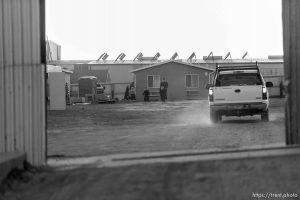 Trent Nelson  |  The Salt Lake Tribune
Women and children seen through a closing security gate at the FLDS bishop's storehouse in Colorado City, Thursday February 25, 2016.