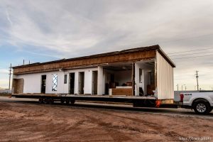 Trent Nelson  |  The Salt Lake Tribune A group of FLDS members move a modular home from a lot in Hildale as part of an eviction from UEP trust property, Wednesday April 5, 2017. Many FLDS members have refused to cooperate with the state-controlled land trust and are now facing eviction.