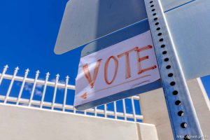 Trent Nelson  |  The Salt Lake Tribune Posted in front of a mansion constructed for imprisoned FLDS leader Warren Jeffs, a sign encourages locals to vote in a primary in Hildale, Monday May 1, 2017.