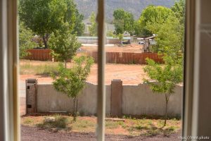 Trent Nelson  |  The Salt Lake Tribune window view, uep home after flds family fled before eviction, Monday May 8, 2017.