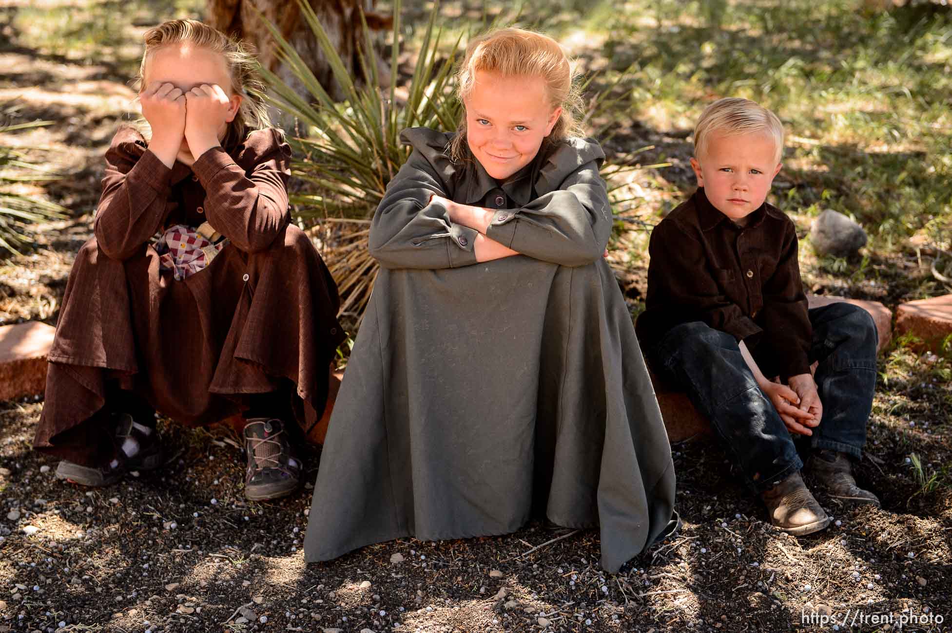 Trent Nelson  |  The Salt Lake Tribune
LeAnne Johnson and her children at their new Cedar City home, Wednesday May 24, 2017. The Johnson family relocated to Cedar City after being evicted from UEP Trust properties in Hildale and Colorado City three times. Children are: Larissa (12, green dress), RosaLe (10, brown dress), Janice (8, dark pink dress), Melinda (6, pink dress), and Willis (4).