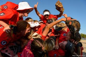 Trent Nelson  |  The Salt Lake Tribune
Spanish Fork players dogpile to celebrate defeating Uintah High School in the Class 4A softball state title game in Taylorsville, Thursday May 25, 2017.