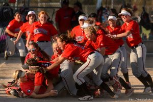 Trent Nelson  |  The Salt Lake Tribune Spanish Fork players celebrate defeating Uintah High School in the Class 4A softball state title game in Taylorsville, Thursday May 25, 2017.