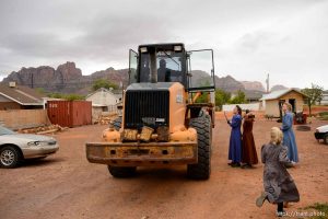 Trent Nelson  |  The Salt Lake Tribune An FLDS man removes a shed from a property in Colorado City, AZ, Tuesday May 9, 2017, as the locks are changed by the UEP Trust on the home next door.