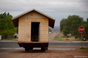 Trent Nelson  |  The Salt Lake Tribune An FLDS man removes a shed from a property in Colorado City, AZ, Tuesday May 9, 2017, as the locks are changed by the UEP Trust on the home next door.