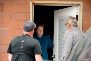 Trent Nelson  |  The Salt Lake Tribune FLDS member Julia Johnson confronts Mohave County Constable Mike Hoggard, disputing the UEP Trust's ability to evict her from a property in Colorado City, AZ, Tuesday May 9, 2017. Ted Barlow at left.