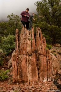 Trent Nelson  |  The Salt Lake Tribune FLDS children watch from the top of a rock as the UEP Trust changes the locks on a Colorado City, AZ, home, Wednesday May 10, 2017.