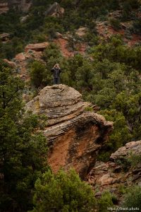 Trent Nelson  |  The Salt Lake Tribune FLDS boy photographs from the top of a rock as the UEP changes the locks on the home at 560 E Johnson Ave, Colorado City, AZ, Wednesday May 10, 2017.