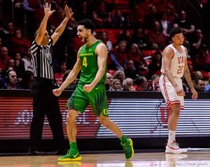 (Trent Nelson | The Salt Lake Tribune)   Oregon Ducks guard Ehab Amin (4) celebrates a turnover by Utah Utes forward Timmy Allen (20) as the Utah Utes host the Oregon Ducks, NCAA basketball in Salt Lake City on Thursday Jan. 31, 2019.