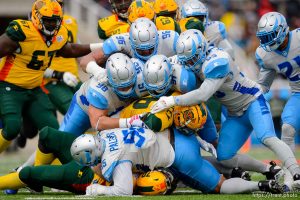 (Trent Nelson | The Salt Lake Tribune)  
Arizona's Jhurell Pressley (26) is brought down by a herd of stallions as the Salt Lake Stallions host the Arizona Hotshots, Alliance of American Football in Salt Lake City on Saturday Feb. 23, 2019.