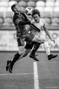 (Trent Nelson  |  The Salt Lake Tribune)  
Copper Hills's Dakota Anderson (9) and Weber's Kolton Obray as Weber faces Copper Hills High School in the 6A boys state championship game at Rio Tinto Stadium in Sandy, Thursday May 23, 2019.